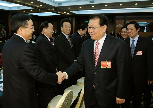 3月5日,中共中央政治局常委李长春参加十一届全国人大二次会议四川代表团的审议。新华社记者黄敬文摄